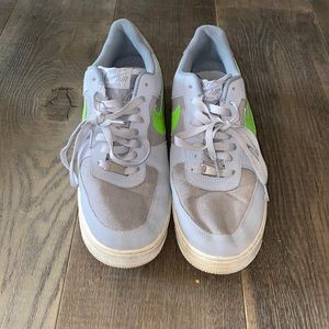 Green and grey Nike shoes